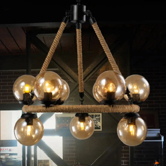 Industrial Black Metal 9-Bulb Ring Chandelier With Gray Glass Globe Shade