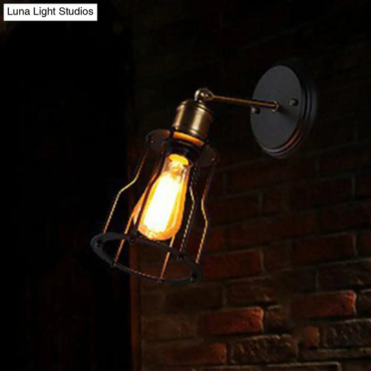 Industrial Black Metal Wall Lamp With Swivel Arm And Cage Shade