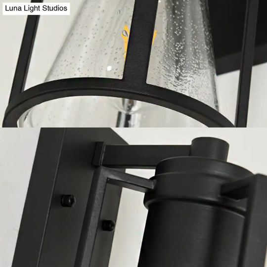 Industrial Black Sconce With Seeded Glass And Metal Cage