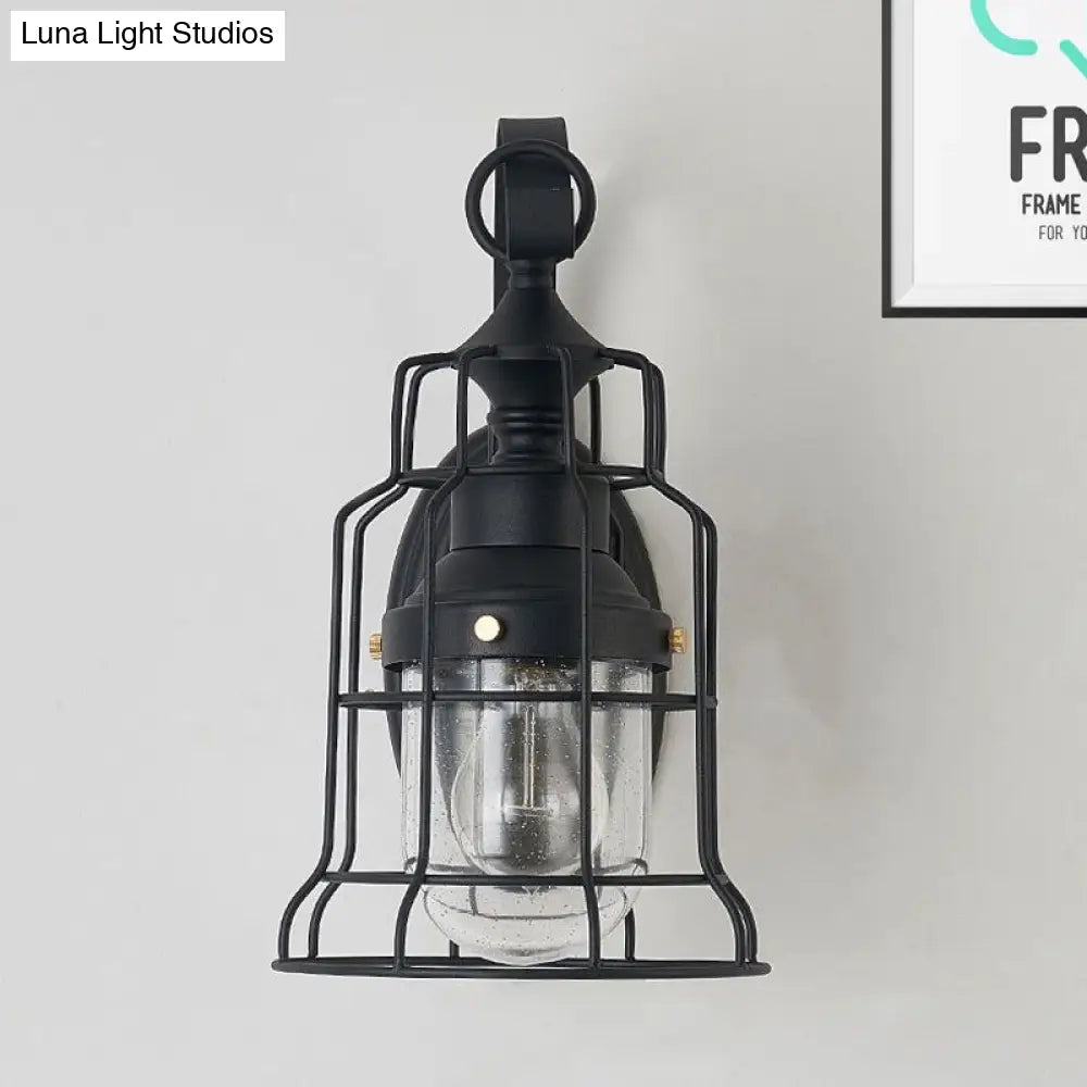 Industrial Black Seedy Glass Wall Sconce With Metal Cage Frame And Bell Shade For Corridor Lighting