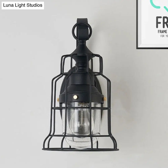 Industrial Black Seedy Glass Wall Sconce With Metal Cage Frame And Bell Shade For Corridor Lighting