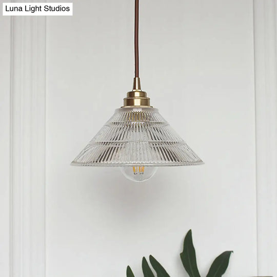 Clear Ribbed Glass Drop Lamp With Industrial Brass Cone Shade - 1-Light Ceiling Light For Dining