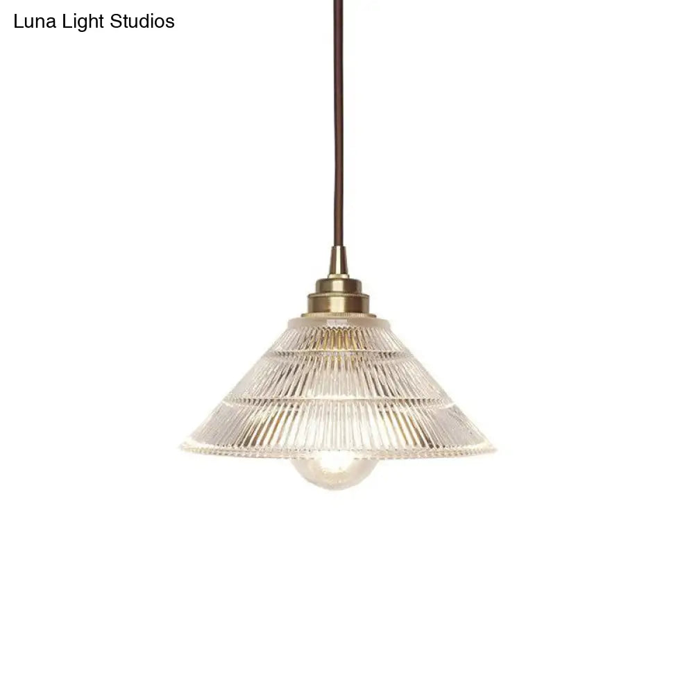 Clear Ribbed Glass Drop Lamp With Industrial Brass Cone Shade - 1-Light Ceiling Light For Dining