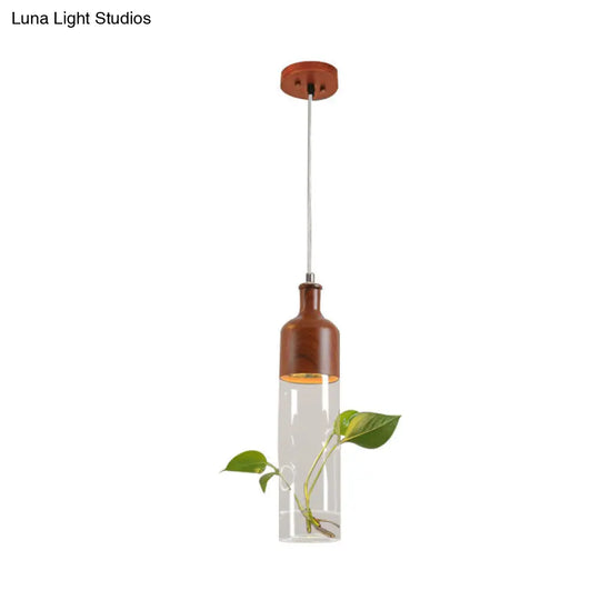 Industrial Brown Wine Bottle Pendant Light - Clear Glass With Led Suspension For Restaurants