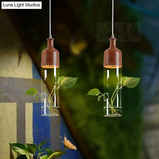 Industrial Brown Wine Bottle Pendant Light - Clear Glass With Led Suspension For Restaurants