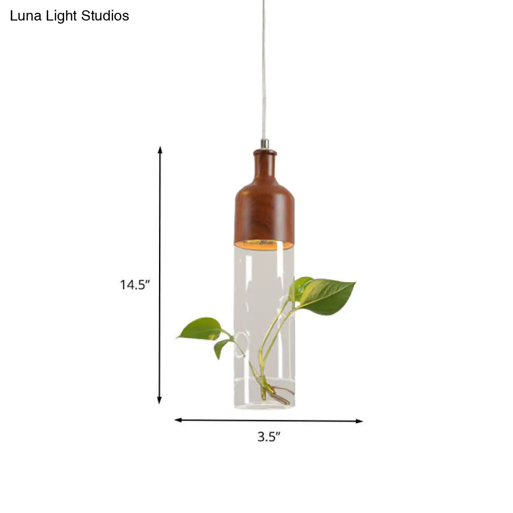 Industrial Brown Wine Bottle Pendant Light - Clear Glass With Led Suspension For Restaurants