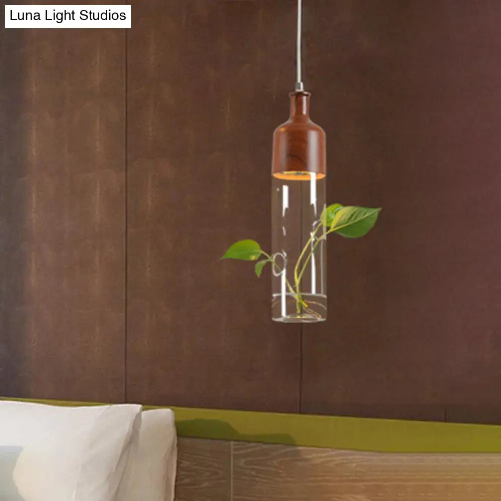 Industrial Brown Wine Bottle Pendant Light - Clear Glass With Led Suspension For Restaurants