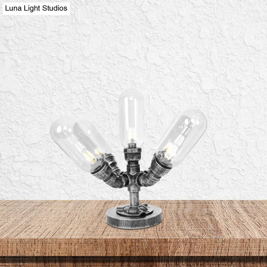 Industrial Clear/Amber Glass Night Lamp - 1/4/5-Bulb Capsule Shade Table Lighting For Bedroom