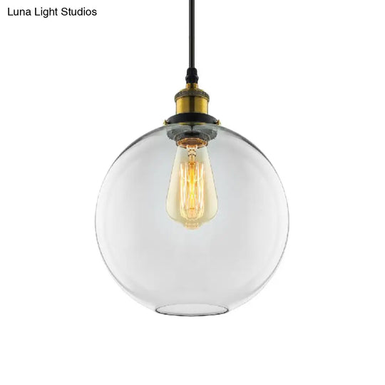 Industrial Globe Clear Glass Pendant Light With Antique Brass Finish - 1-Light Hanging Kit