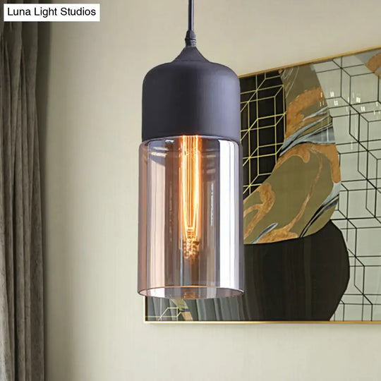 Industrial Cylinder Pendant Light With Brown Glass Shade - 1-Light Hanging Ceiling Fixture In Black