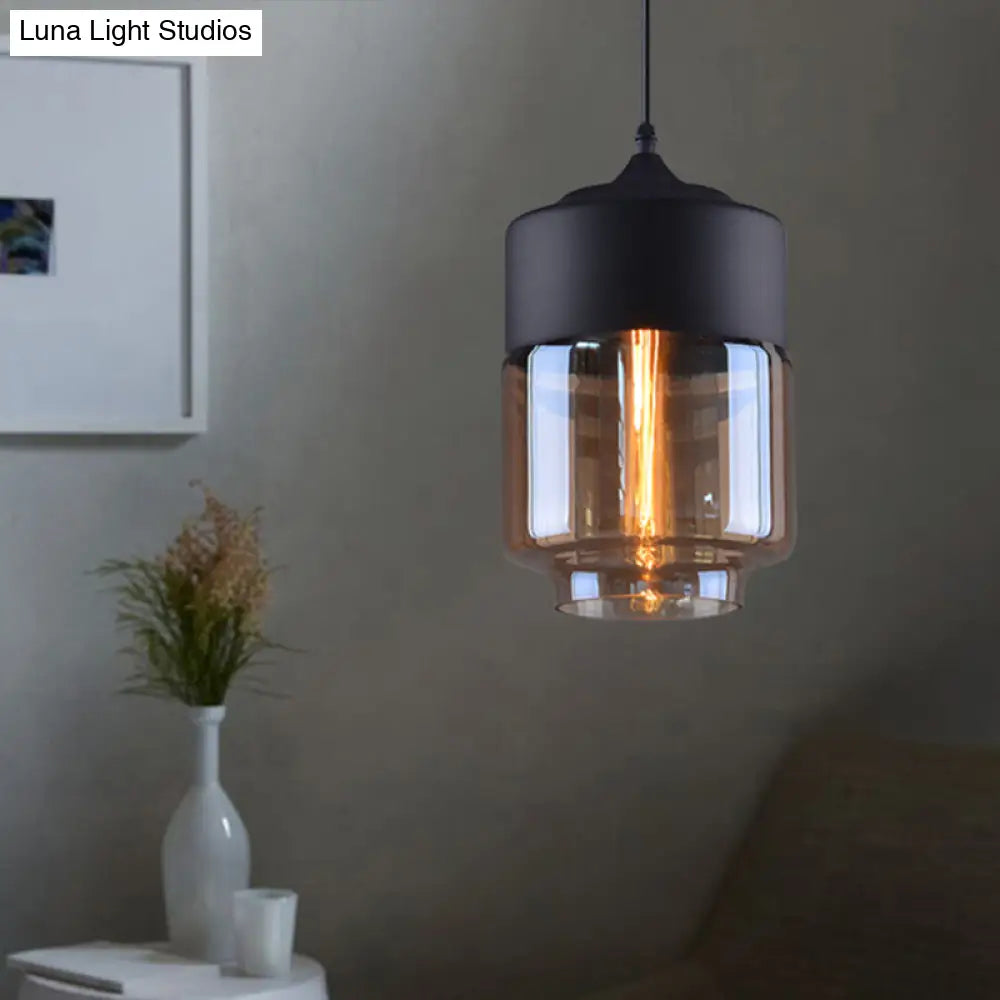 Industrial Cylinder Pendant Light With Brown Glass Shade - 1-Light Hanging Ceiling Fixture In Black