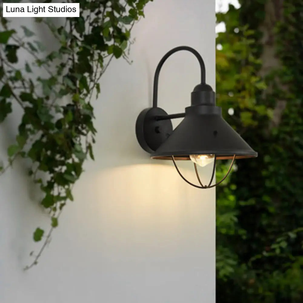 Industrial Flare Sconce Light: Black Metal Outdoor Fixture With Cage