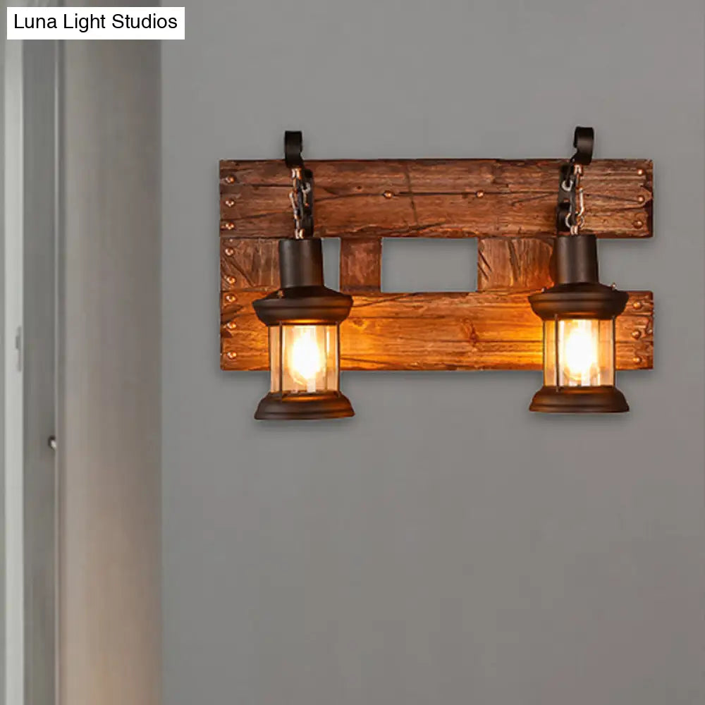 Industrial Lantern Wall Sconce - Clear Glass Black 2-Light Fixture With Wooden Backplate