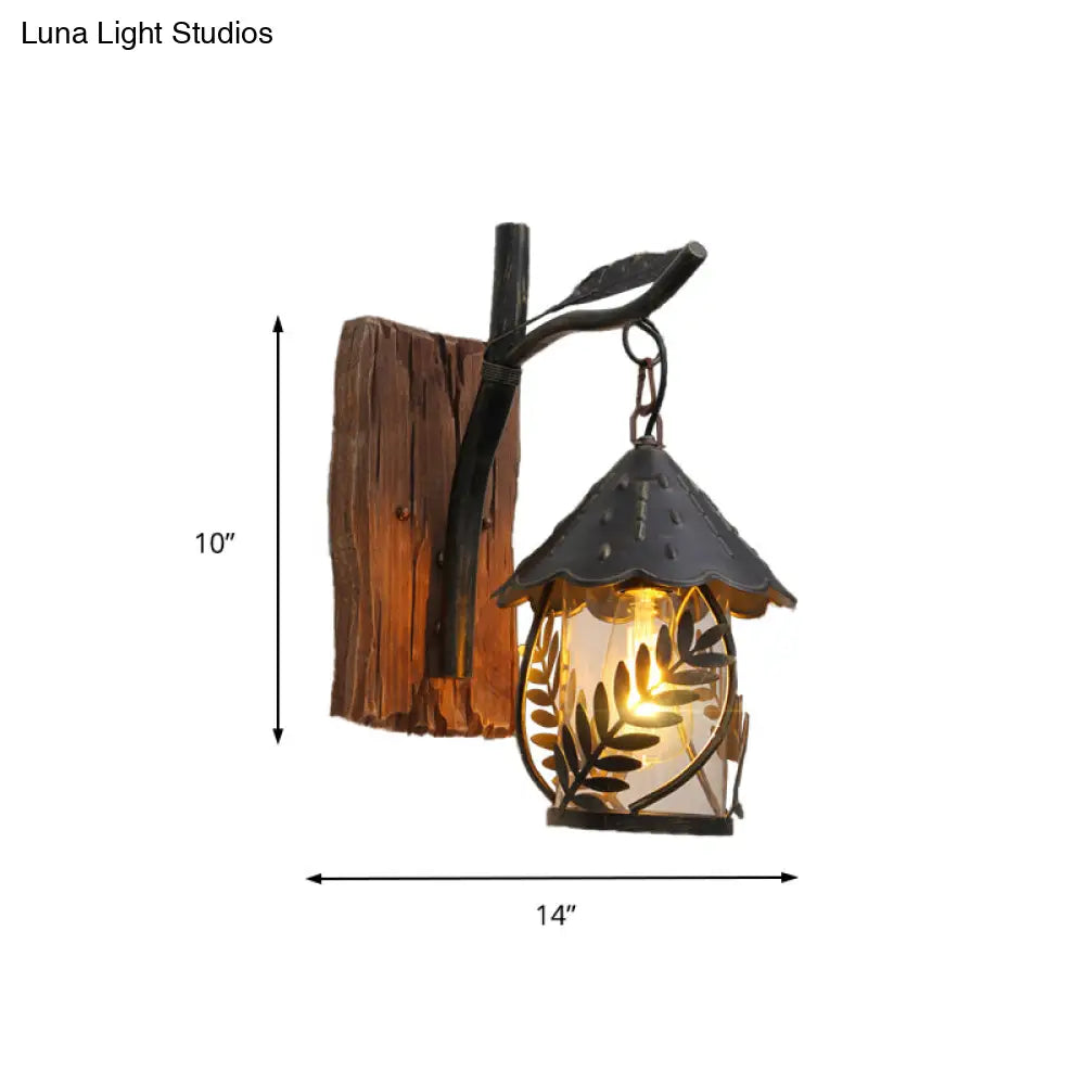 Industrial Living Room Sconce: One Bulb Wall Light With Clear Glass Cylinder Shade And Leaf Branch