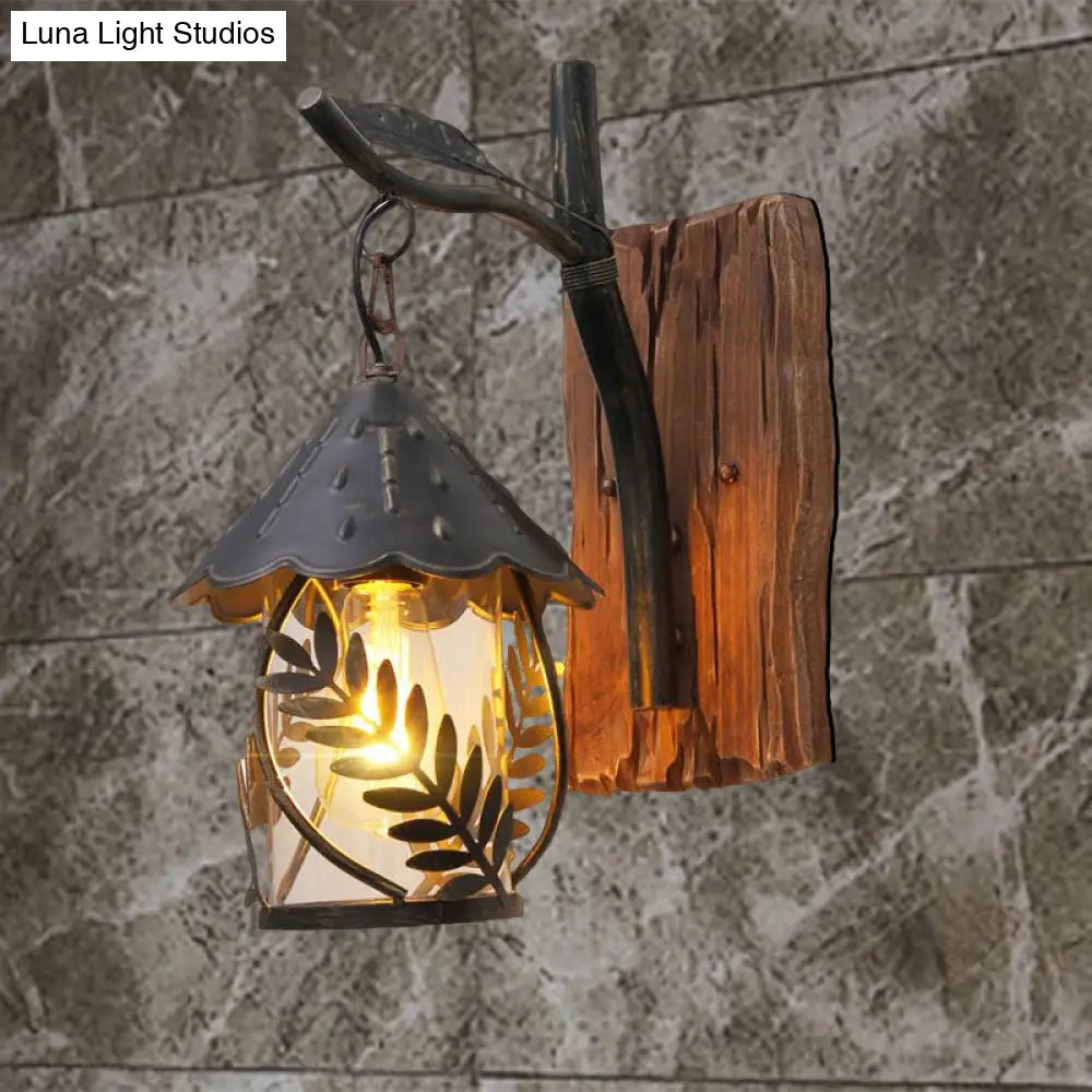 Industrial Living Room Sconce: One Bulb Wall Light With Clear Glass Cylinder Shade And Leaf Branch