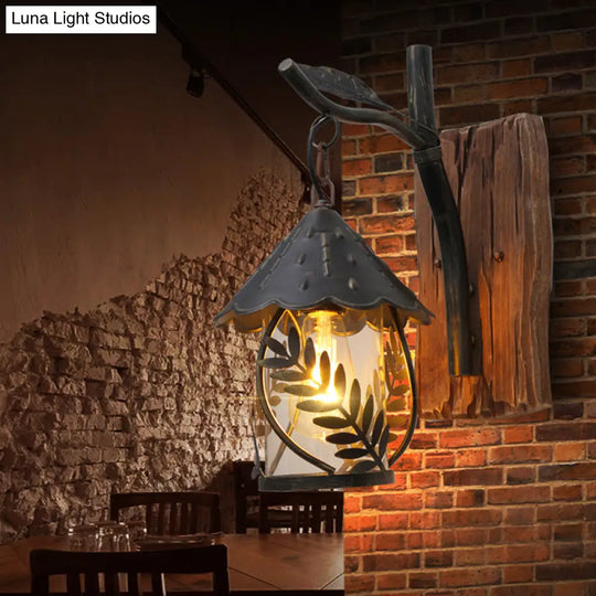 Industrial Living Room Sconce: One Bulb Wall Light With Clear Glass Cylinder Shade And Leaf Branch