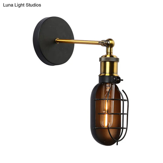 Industrial Metal Black And Brass Wall Lamp With Capsule Cage Design - 1 Head Sconce For Restaurant