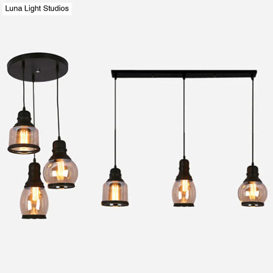Industrial Amber Glass Pendant Light For Coffee Shops - 3-Light Black Ceiling Fixture