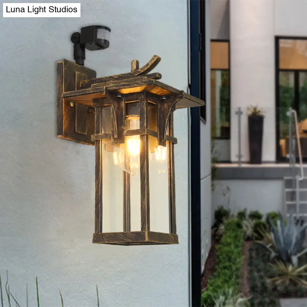 Industrial Outdoor Wall Sconce - Black/Brass Finish Clear Water Glass 1-Light