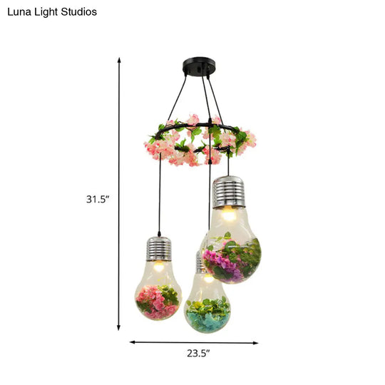 Industrial 3-Light Clear Glass Pendant Ceiling Lamp With Flower Decoration And Led Bulbs In Black