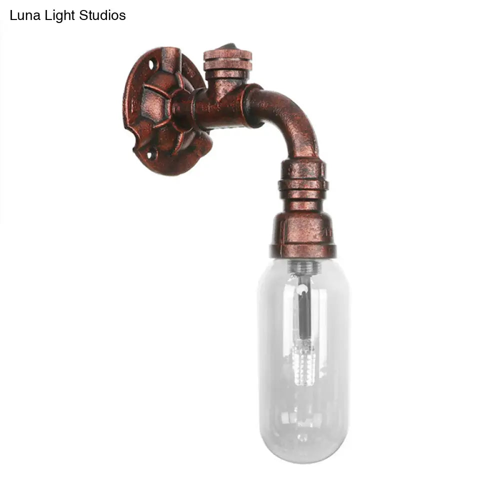 Industrial Pipe Wall Sconce: Clear Glass & Weathered Copper Finish 1-Light Capsule Lighting