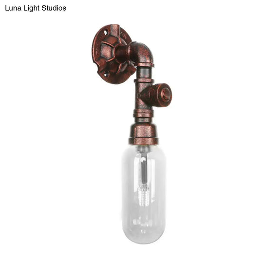 Industrial Pipe Wall Sconce: Clear Glass & Weathered Copper Finish 1-Light Capsule Lighting