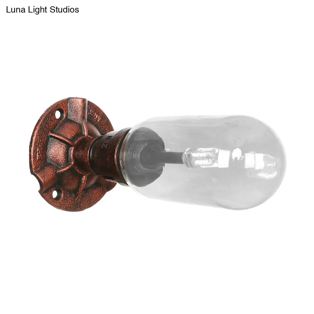 Industrial Pipe Wall Sconce: Clear Glass & Weathered Copper Finish 1-Light Capsule Lighting