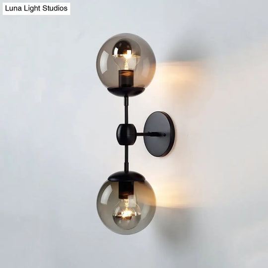 Industrial-Style Black 2-Light Sconce With Amber Glass Globes - Perfect For Living Room Lighting