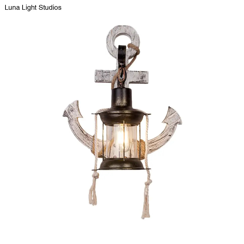 Industrial Style Wall Mount Oil Lamp With Clear Glass Shade And Black Metal Frame