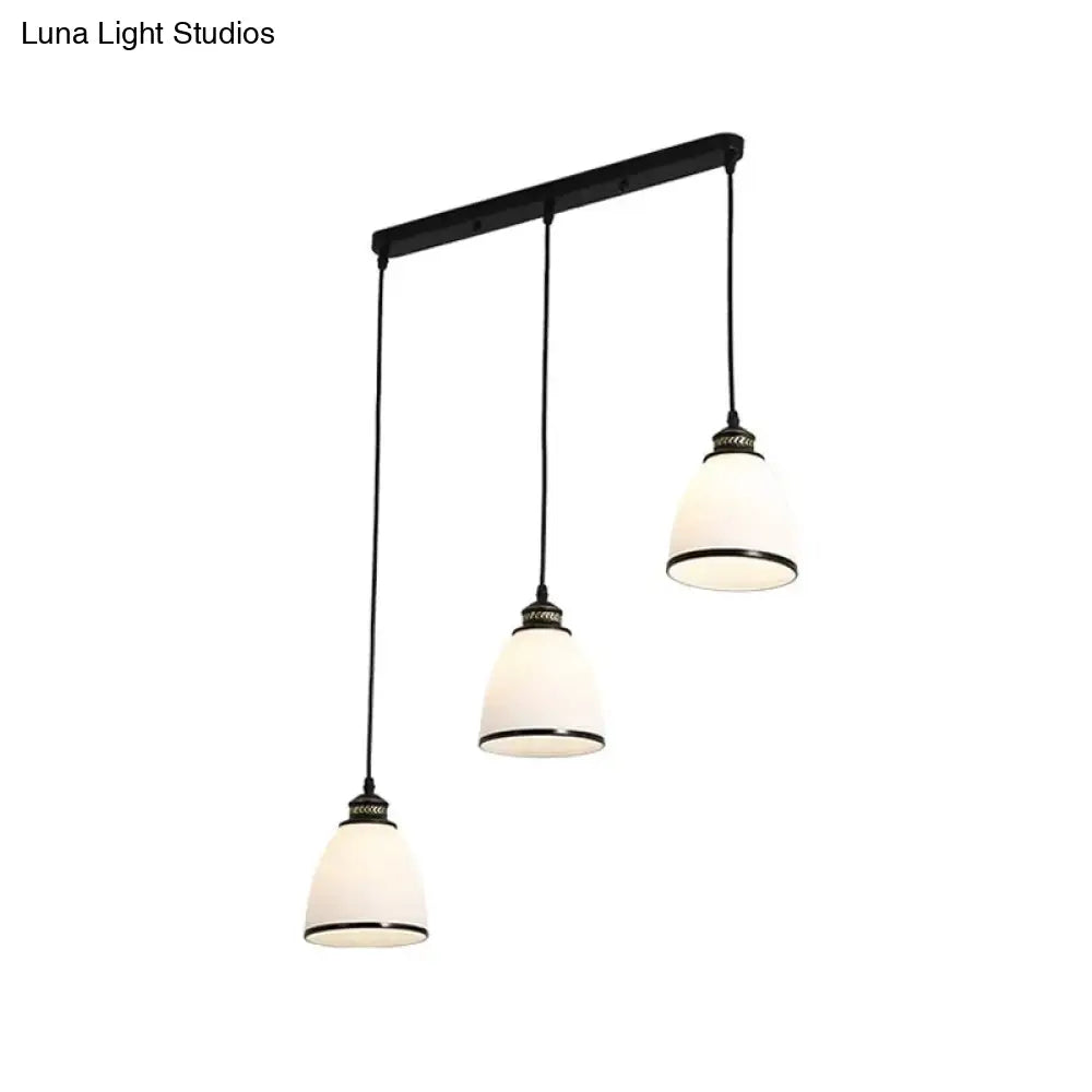 Ivory Glass Bell Pendant Light Cluster With Minimalist Design And Black Canopy - 3 Lights