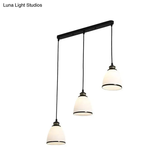 Ivory Glass Bell Pendant Light Cluster With Minimalist Design And Black Canopy - 3 Lights