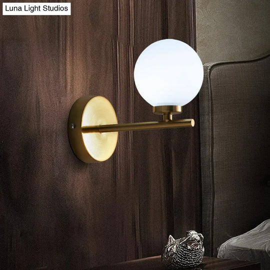 Ivory Glass Single Wall Sconce With Gold Finish For Bedroom - Simple And Elegant