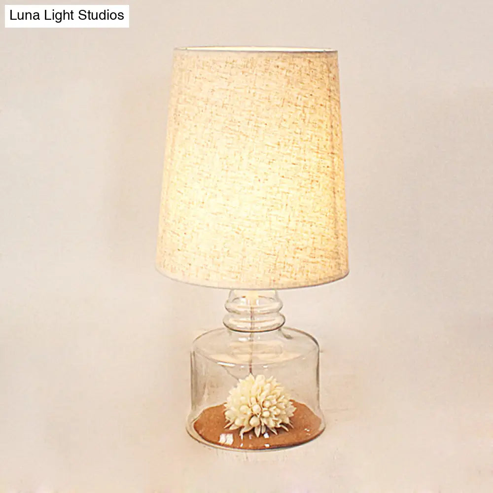 Pastoral 1-Bulb Fabric Night Light With Dried Flower And Glass Base - Clear/Blue/Black Bucket Table