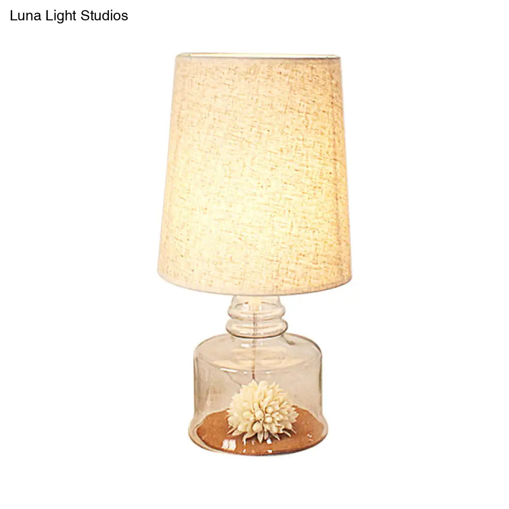 Pastoral 1-Bulb Fabric Night Light With Dried Flower And Glass Base - Clear/Blue/Black Bucket Table