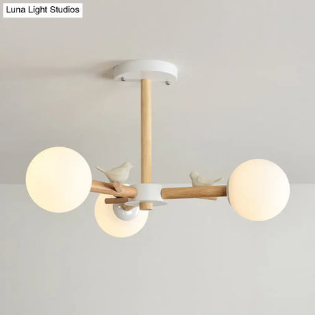Japanese-Inspired Bedroom Chandelier With Orb Shade Birds Wood And Glass In White
