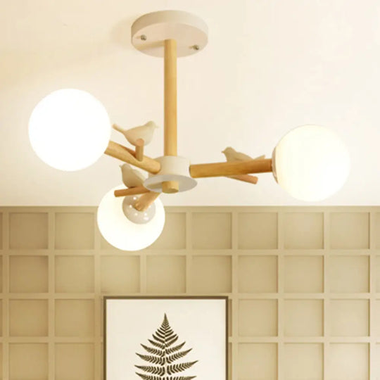 Japanese-Inspired Bedroom Chandelier With Orb Shade Birds Wood And Glass In White 3 /
