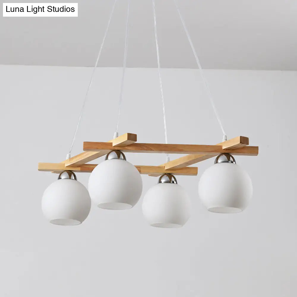Japanese Style 4-Bulb Cream Glass Sphere Pendant Chandelier For Living Room In Wood
