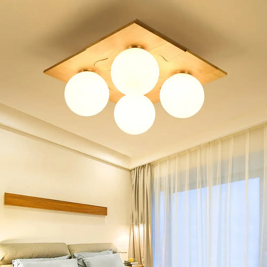 Japanese Style Round Flush Mount Ceiling Light Fixture With White Glass And Wooden Accent - 4 Bulb