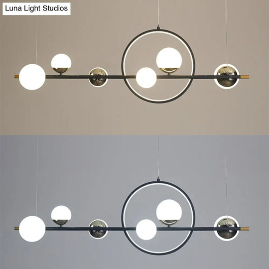 Modern Black Metal Pendant Light With Spherical Glass Shades - Perfect For Dining Table