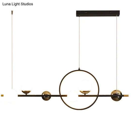 Modern Black Metal Pendant Light With Spherical Glass Shades - Perfect For Dining Table