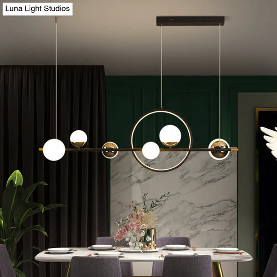 Modern Black Metal Pendant Light With Spherical Glass Shades - Perfect For Dining Table