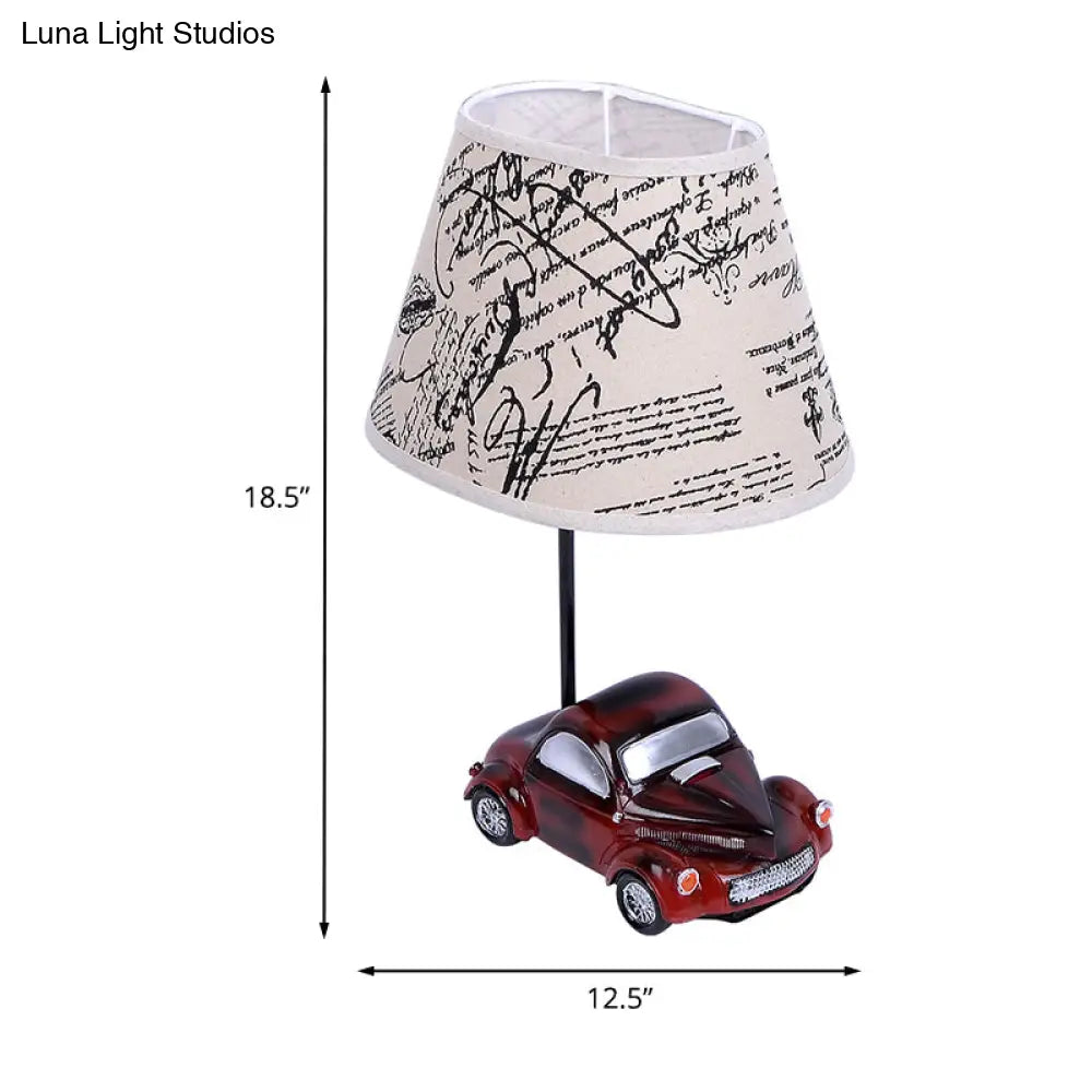 Kids Beige Barrel Night Table Lamp With Car Base - 1-Light Fabric Bedroom Nightstand Light