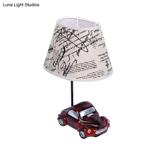 Kids Beige Barrel Night Table Lamp With Car Base - 1-Light Fabric Bedroom Nightstand Light