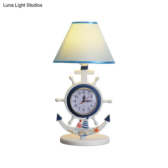 Kids Blue Desk Lamp With Clock Design - 1 Bulb Bedchamber Table Light

(Shorter Title While Still