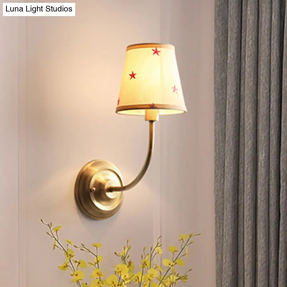 Kids White Wall Light Kit With Conical Star Patterned Fabric Sconce Brass Curvy Arm & 1 Bulb