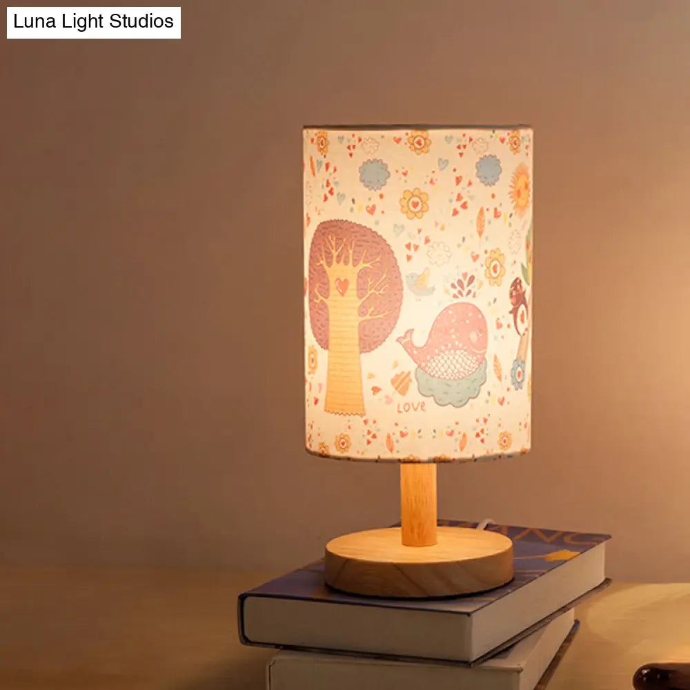 Kids Wood Cylinder Nightstand Lamp With Tree And Flower Pattern - Fabric Shade