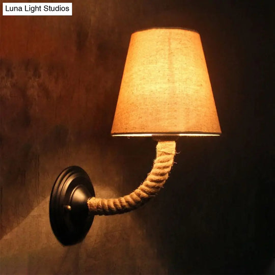 Lodge Style Beige Fabric Wall Sconce With Curved/Angle Arm For Restaurants - 1 Light