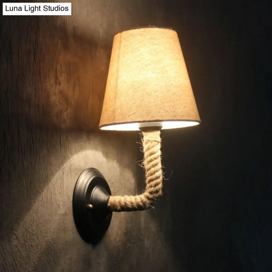 Lodge Style Beige Fabric Wall Sconce With Curved/Angle Arm For Restaurants - 1 Light