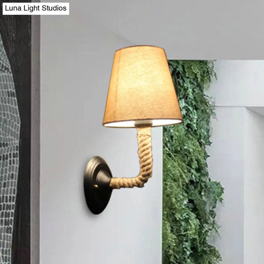 Lodge Style Beige Fabric Wall Sconce With Curved/Angle Arm For Restaurants - 1 Light