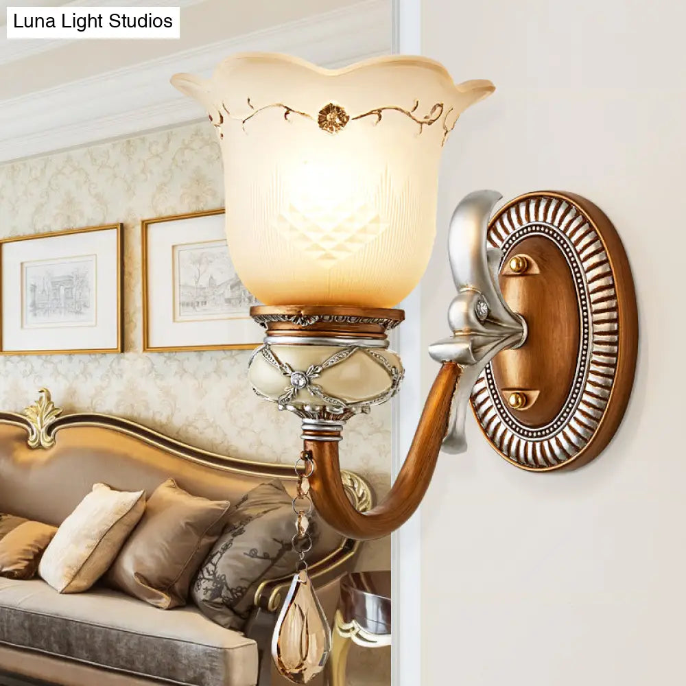 Lodge Style Flower Wall Lamp With Frosted Glass Teardrop Crystal Deco And Metal Arm In Gold -